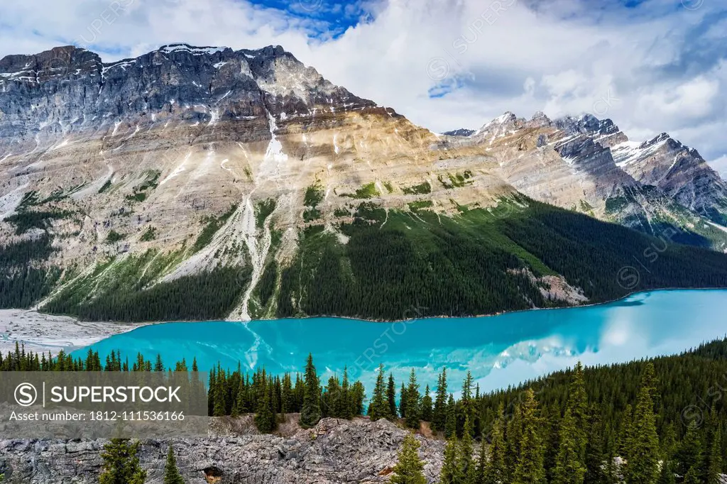 Bright blue water of Peyto Lake in the Rocky Mountains of Banff National Park along the Icefield Parkway; Improvement District No. 9, Alberta, Canada