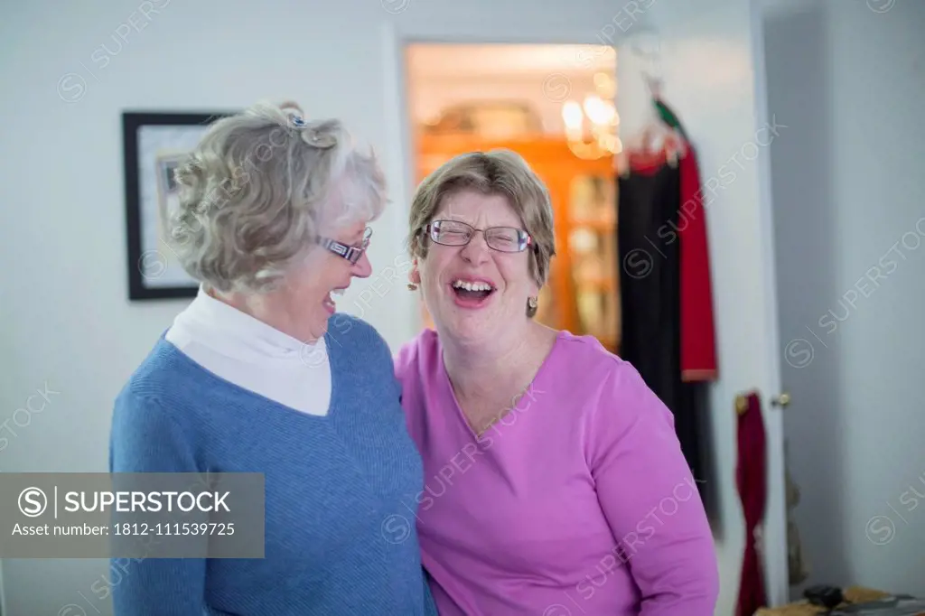 Woman with Autism smiling with her mother