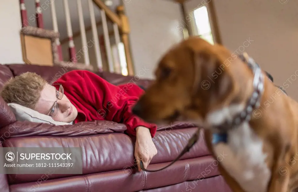 Boy with Anxiety Disorder and his therapy dog