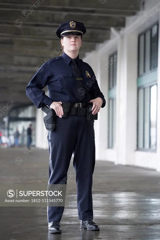 Female police officer standing.