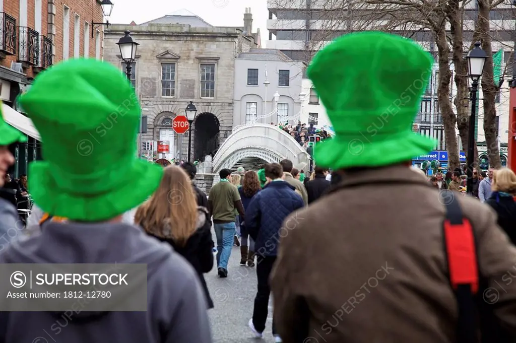 Dublin, Ireland, People Dressed Up In Green Hats Walking Down The Street