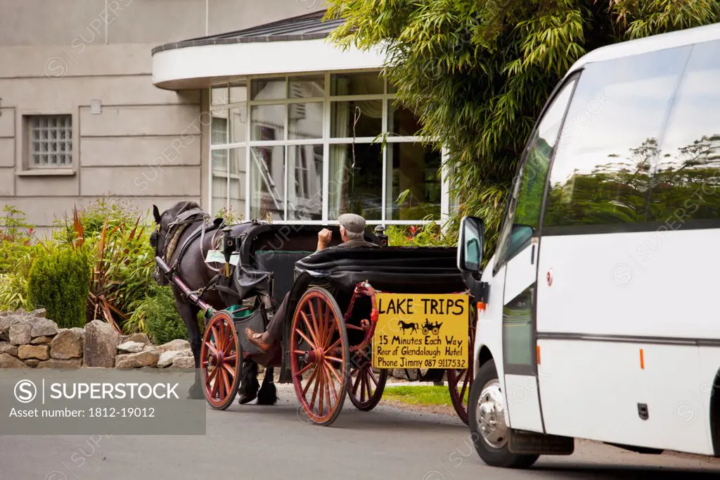 Horse And Buggy Next To Bus At The Glendalough Retreat Centre; Glendalough, County Wicklow, Ireland