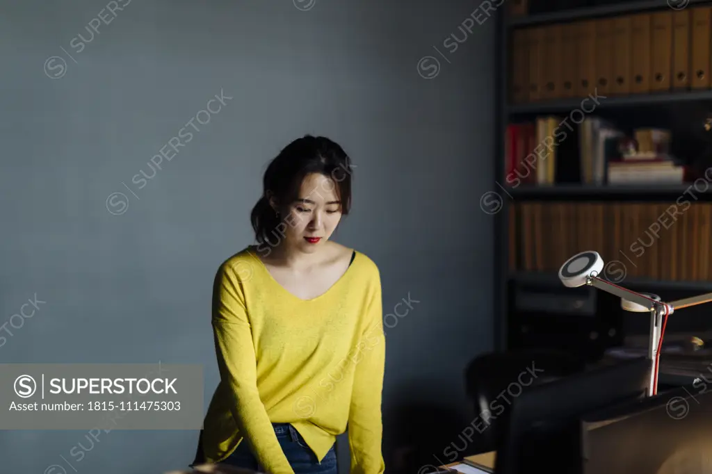 Young woman working in design office