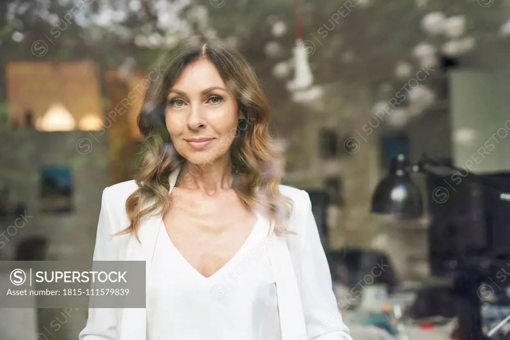 Business woman behind window