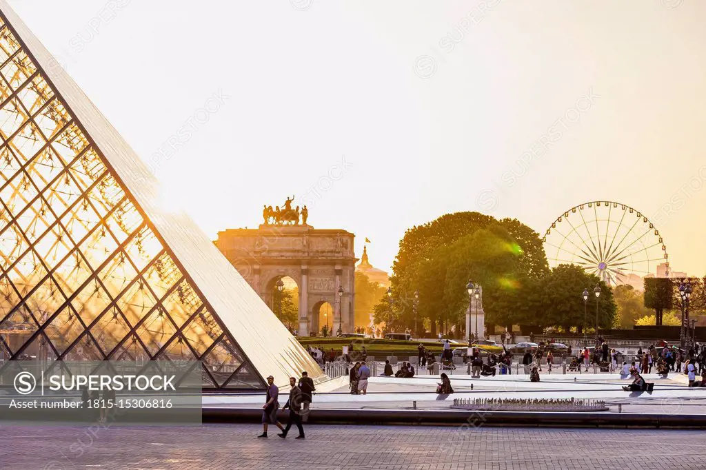 France, Paris, Glass pyramid at the Louvre musem at sunset