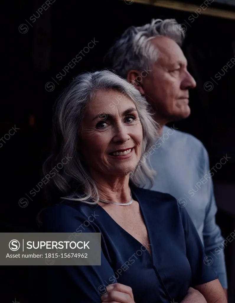 Portrait of smiling mature woman with senior husband