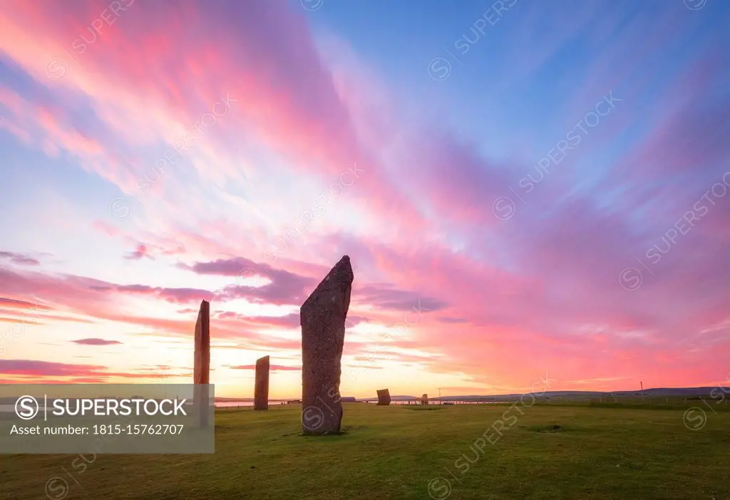 UK, Scotland, Mainland, Clouds over Standing Stones of¶ÿStenness¶ÿat moody sunset