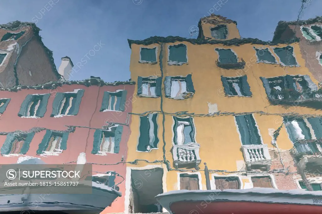 Italy, Venice, Houses reflecting in canal