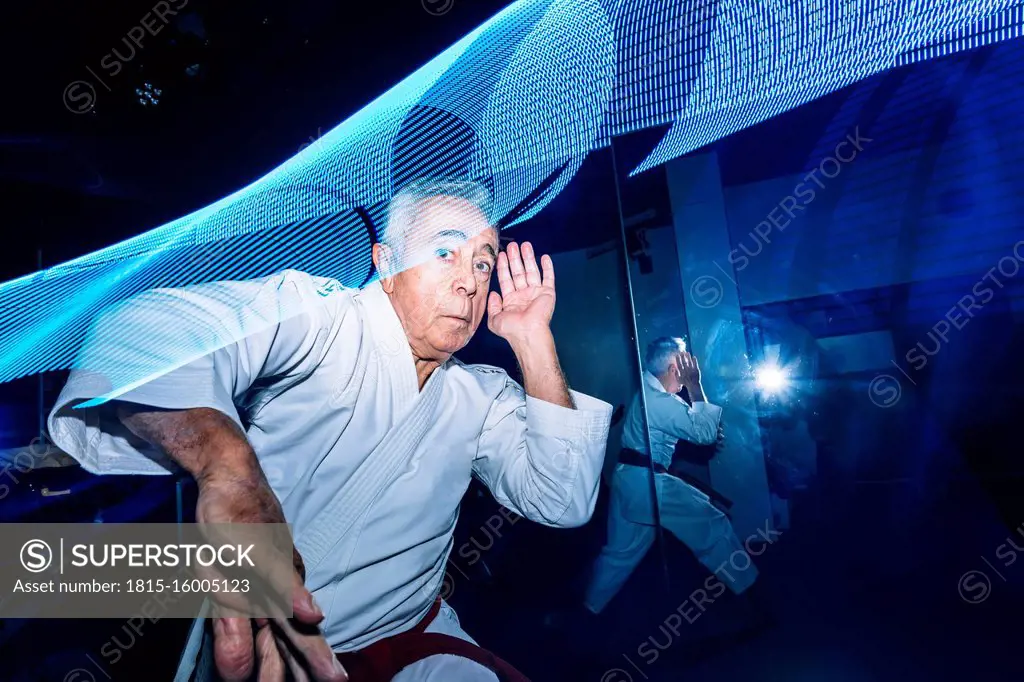 Composite of senior man practicing karate