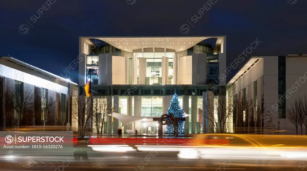 Germany, Berlin, View of chancellery with christmas tree at night