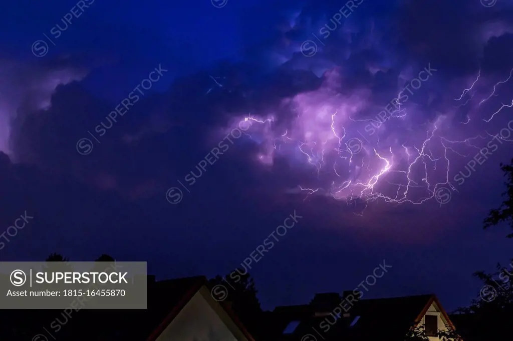 Germany, Hamburg, dramatic night sky at heavy thunderstorm