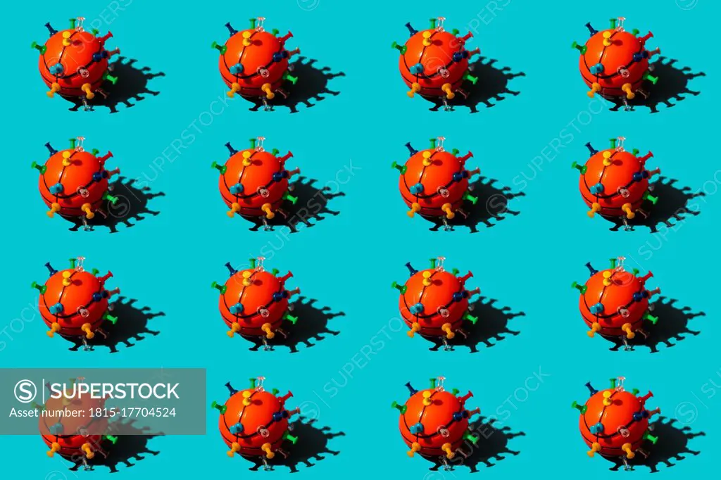 Pattern of thumbtacked basketballs resembling virus cells