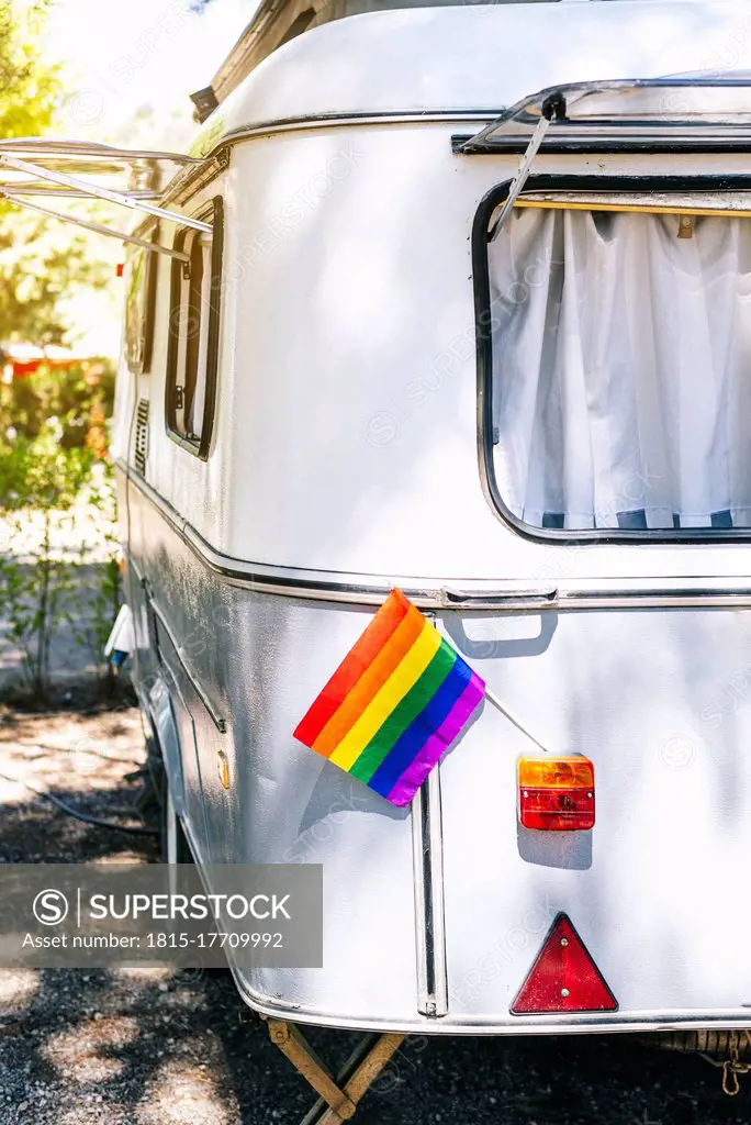 Close-up of rainbow flag in tail light on motor home