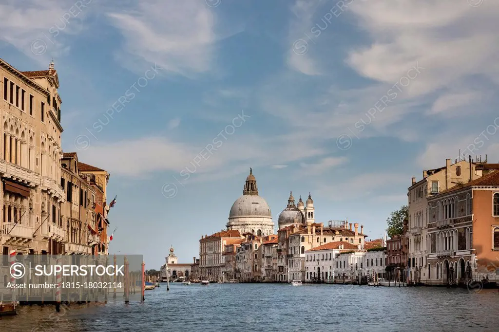 Italy, Veneto, Venice, City canal with Santa Maria della Salute in background