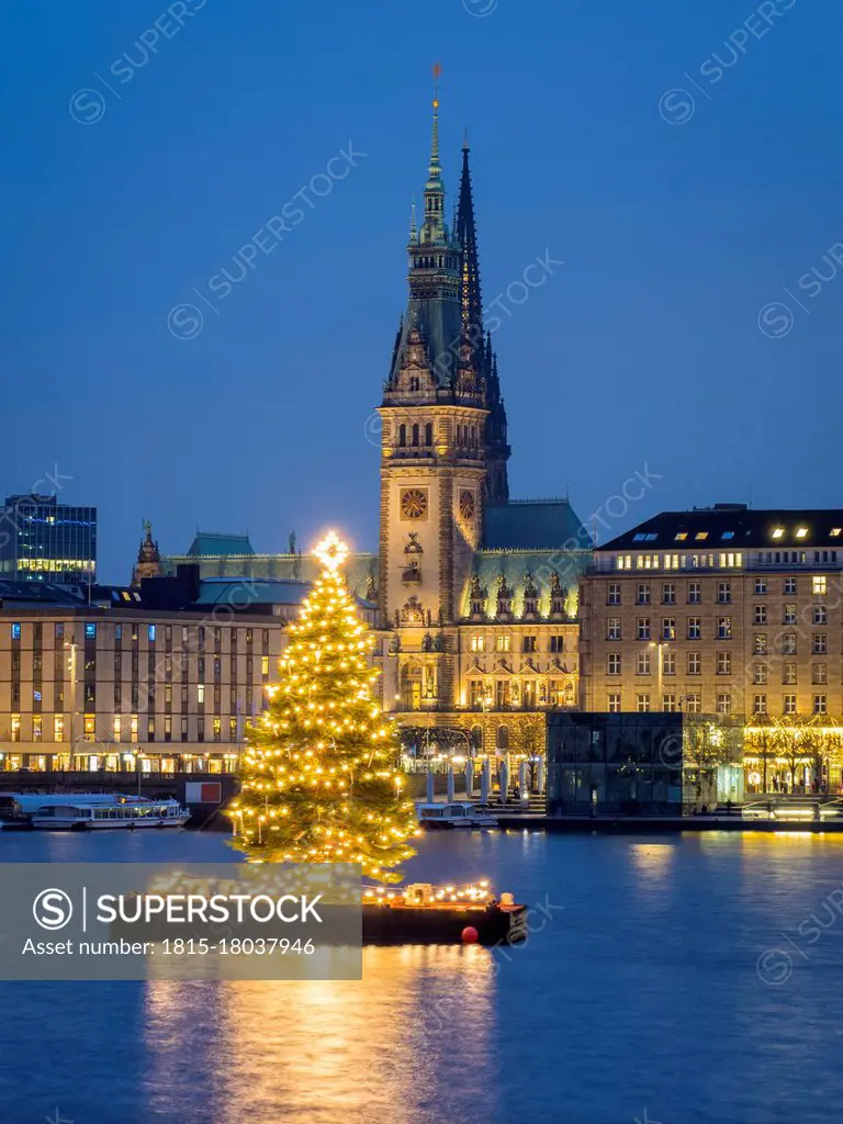 Germany, Hamburg, Inner Alster, Town hall, lake and city view with Christmas decorations