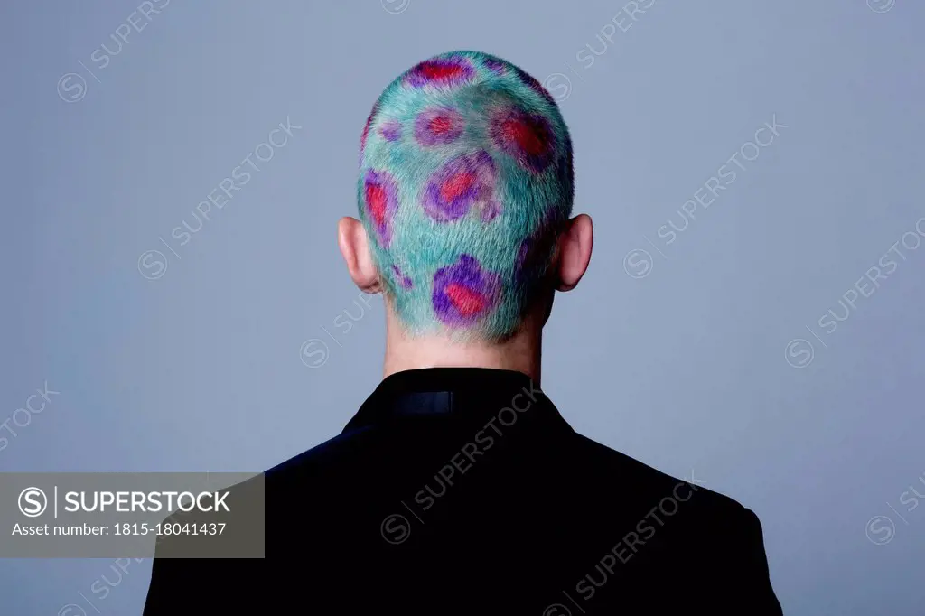 Young man with dyed shot hair studio