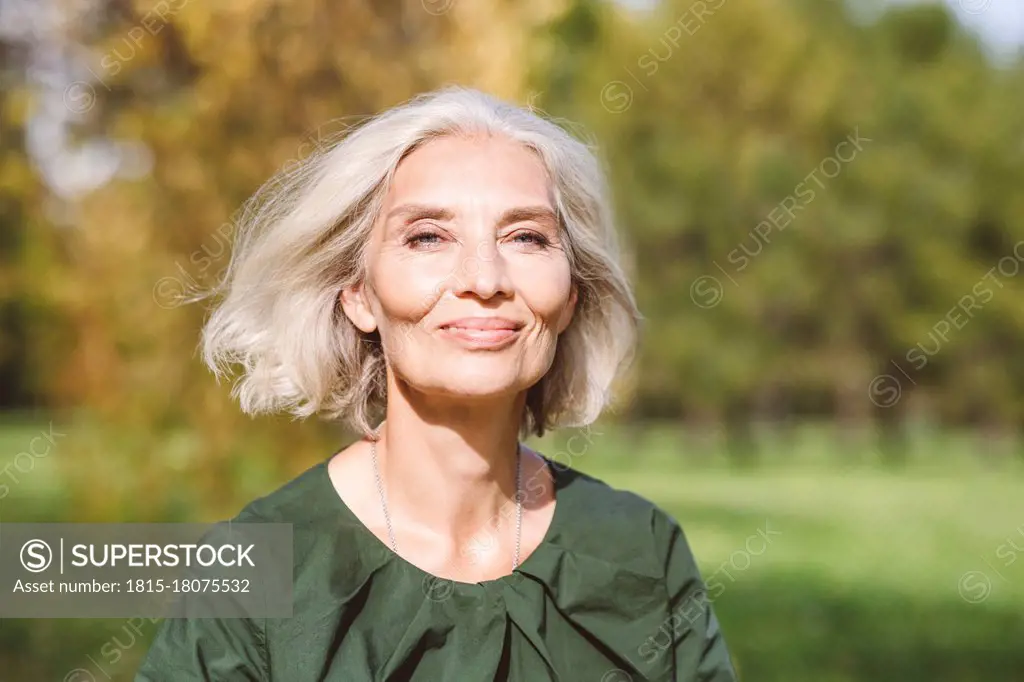 Beautiful mature woman at park