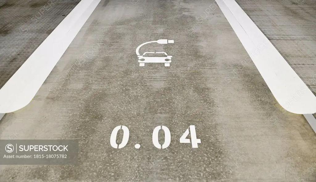 Marking on parking space for electric cars in parking garage