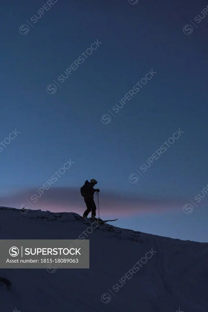 Mature man skiing during winter