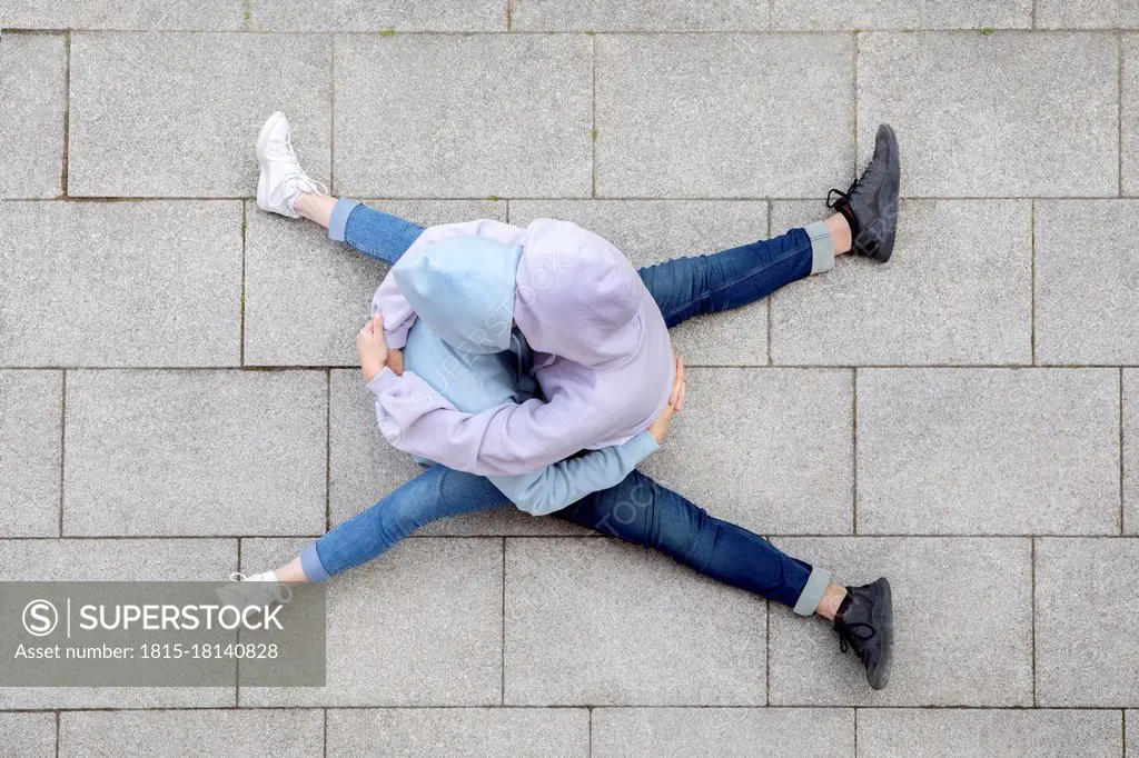 Couple embracing while kissing each other outdoors