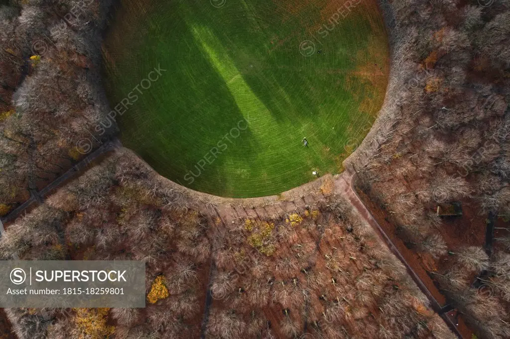 Sweden, Scania, Malmo, Aerial view of circular glade of Pildammsparken in autumn