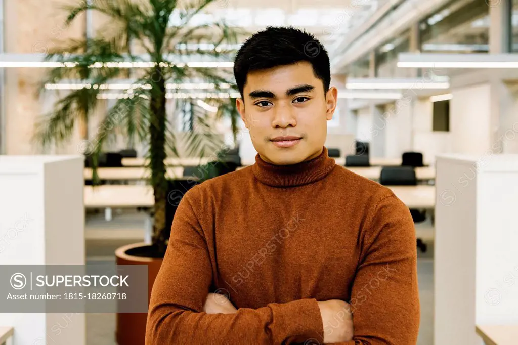 Young male entrepreneur in business casual at office