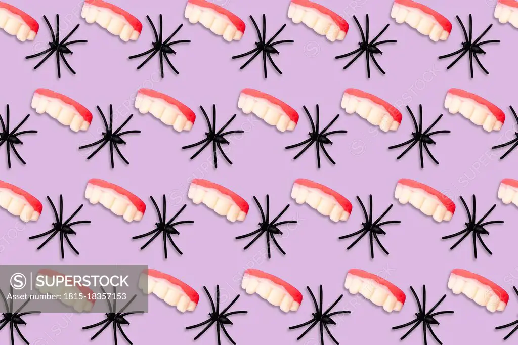 Halloween pattern of spiders and teeth candy