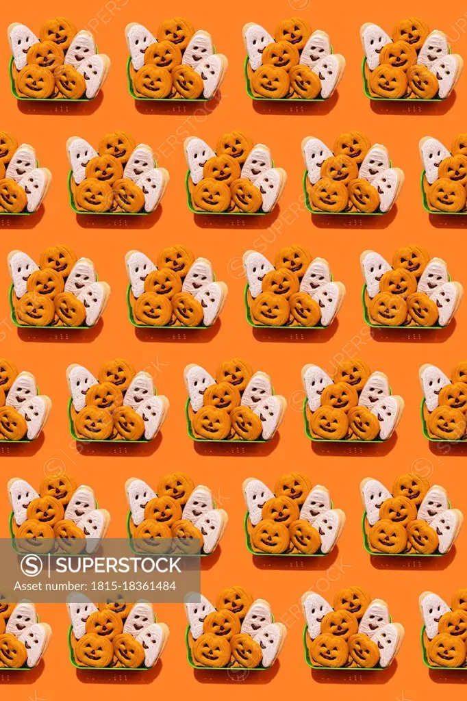 Pattern of baskets filled with Halloween themed cookies