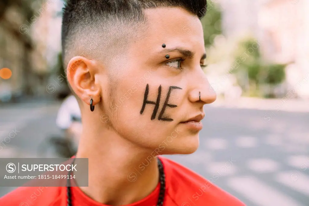 Female activist looking away on street