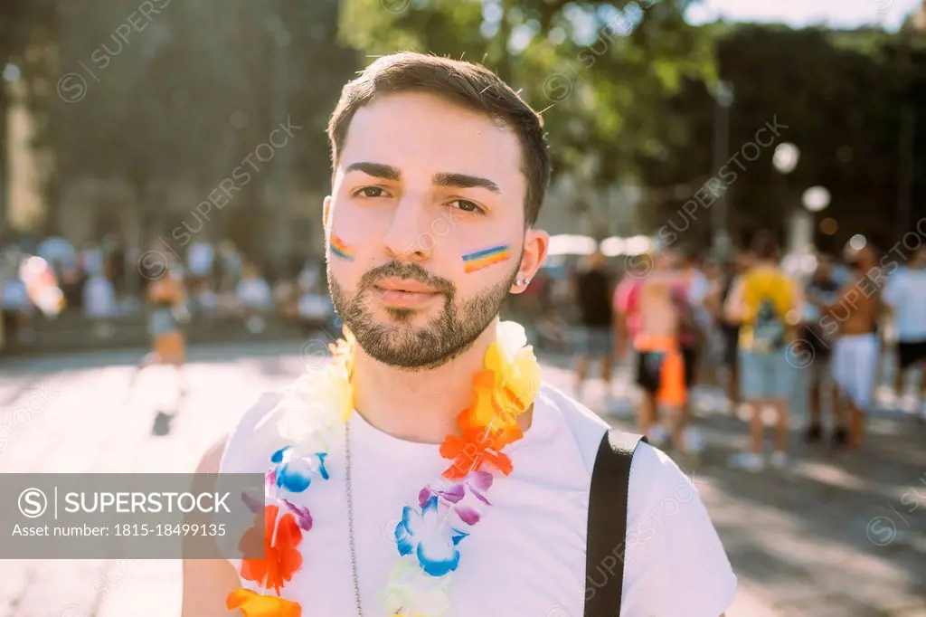 Young male protester on street during sunny day