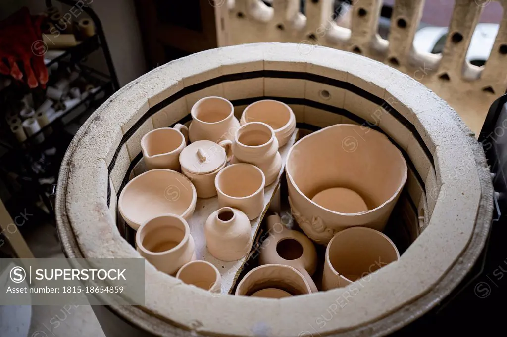 Collection of ceramics pottery in container