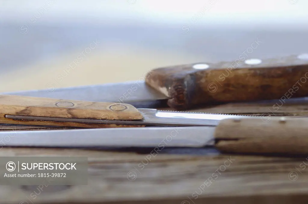 Knives on chopping board