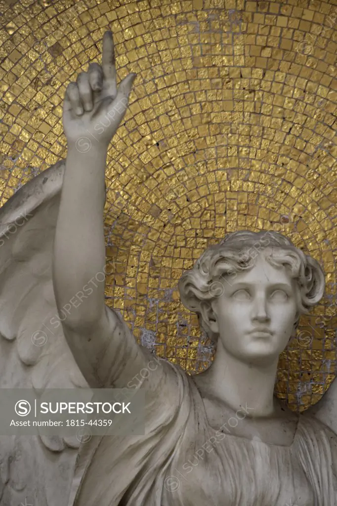 Germany, Frankfurt, graveyard, statue of angel pointing up, close-up