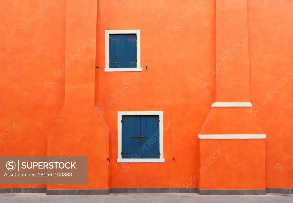 Italy, Province of Venice, Caorle, Facade of building with chimney