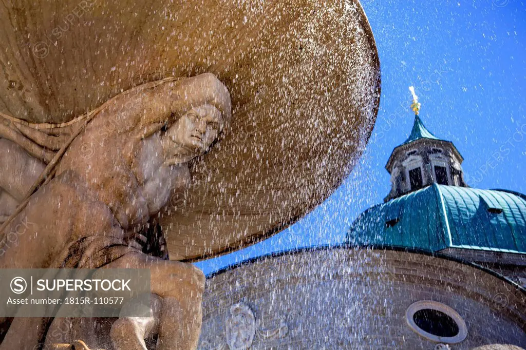 Austria, Salzburg, View of statue, Salzburg Cathedral in background