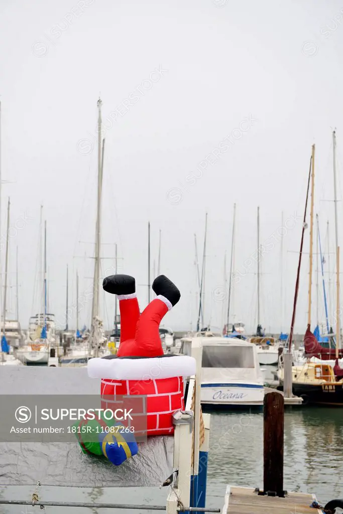 USA, California, San Francisco, boat with Santa Claus figure in harbor