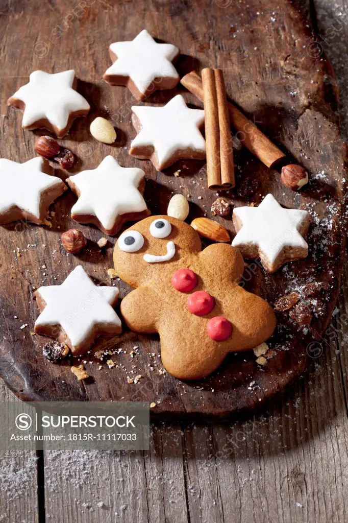 Christmas pastry, Cinnamon stars and gingerbread man on board