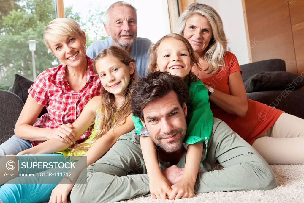 Germany, Bavaria, Nuremberg, Portrait of family in living room