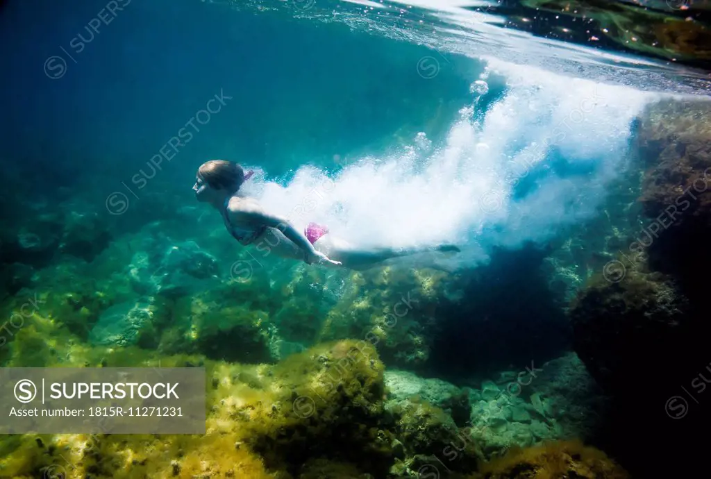 Croatia, Brac, Sumartin, Teenage girl under water