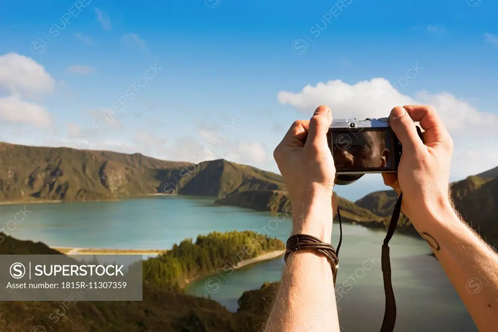 Portugal, Azores,Sao Miguel, Tourist capturing view