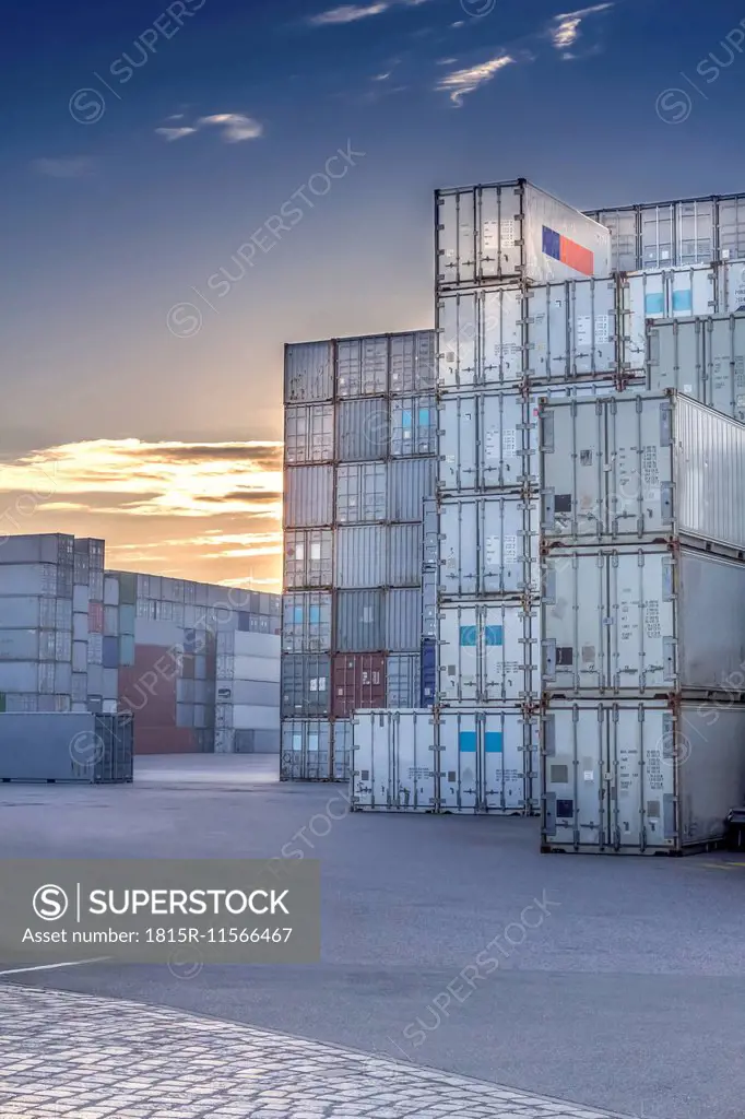 Germany, Hamburg, Stacked shipping containers at harbour