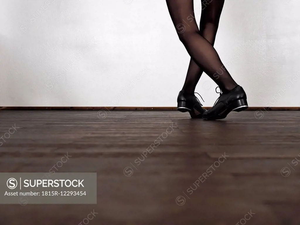 Legs of step dancing woman