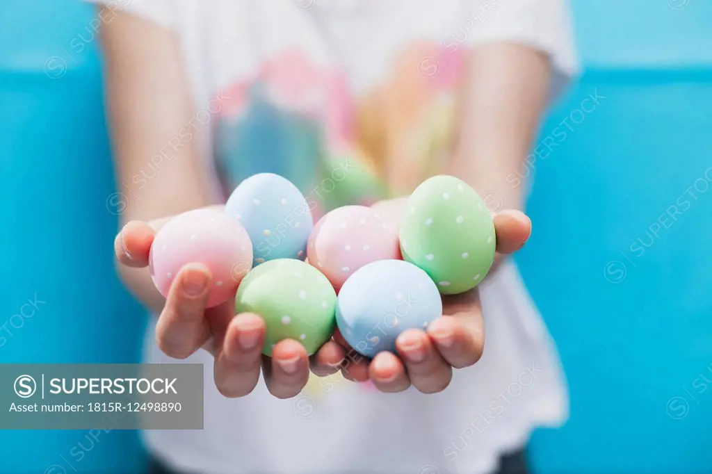 Woman holding Easter eggs