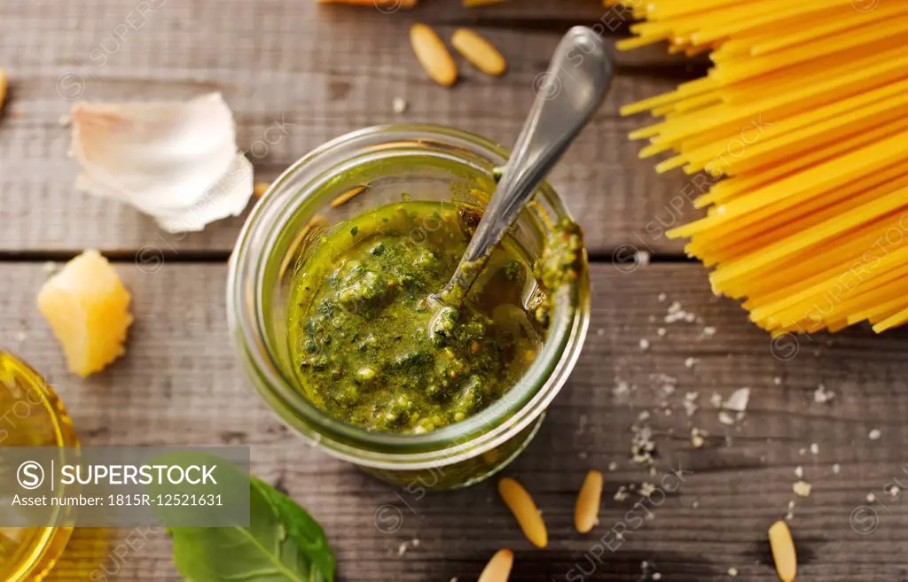 Preserving jar of homemade basil pesto