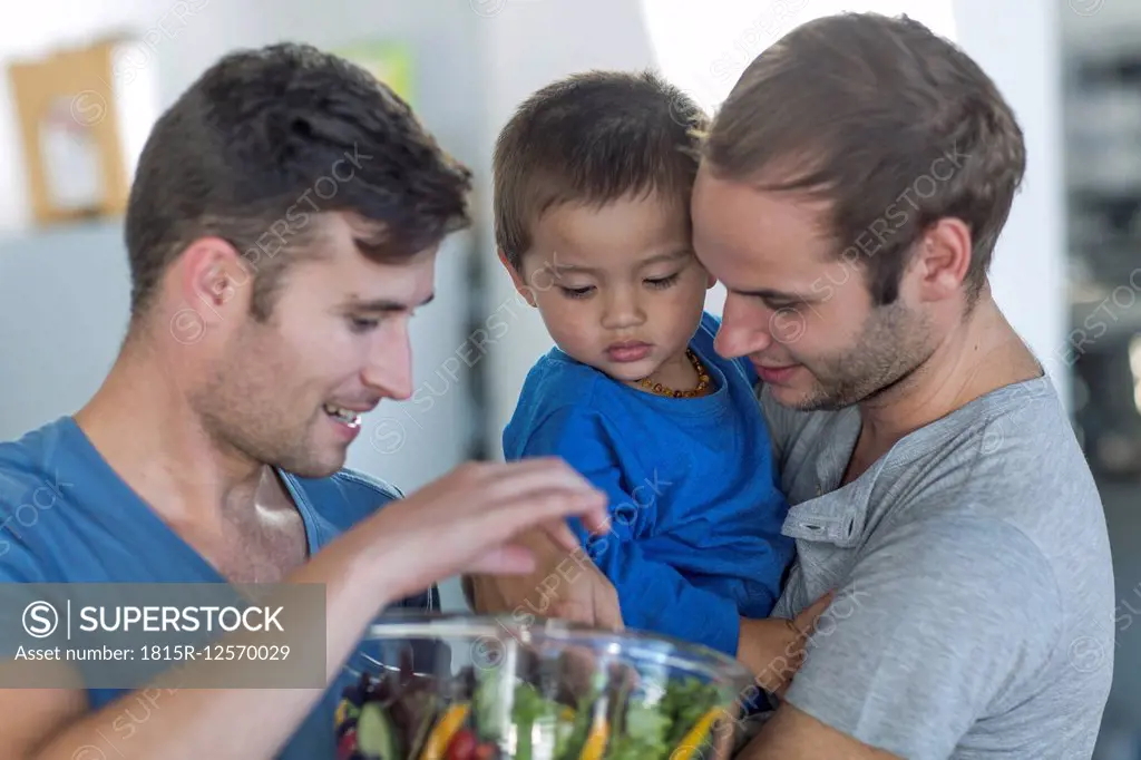 Gay couple with kid