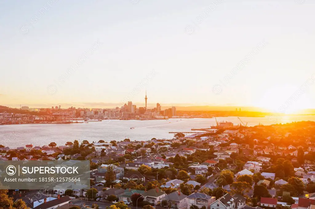 New Zealand, Auckland, Skyline with Sky Tower at sunset