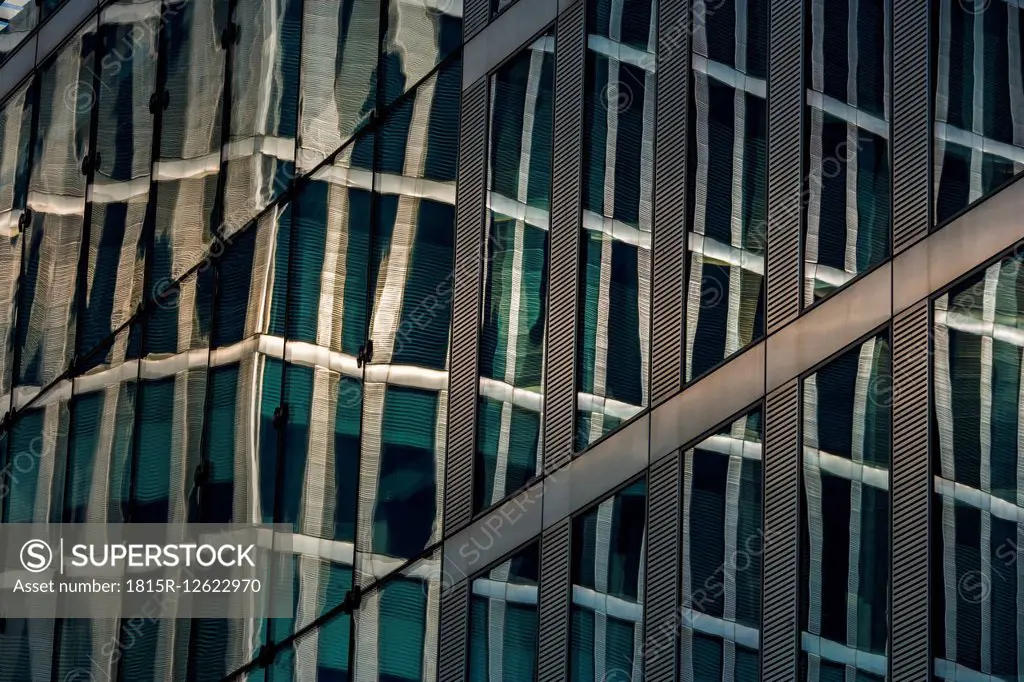 Germany, Munich, reflection of Highlight Towers in an other building