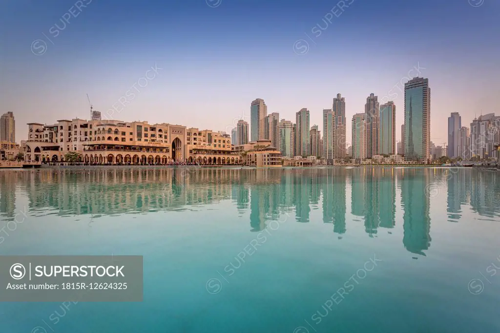 United Arab Emirates, Dubai, Burj Khalifa Lake and Souk Al Bahar in the evening