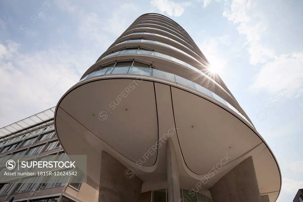 Germany, Hamburg, upward view of oval tower house at Harbour City