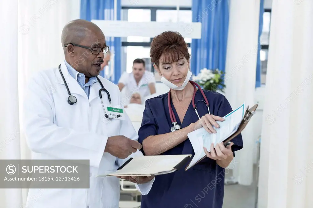 Two doctors in hospital talking